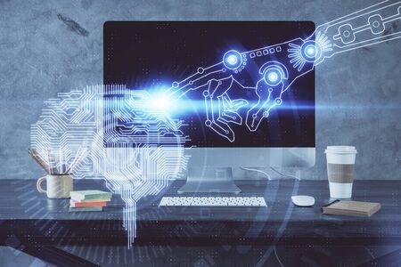 Double exposure of table with computer and brain hologram. Data innovation concept.の写真素材