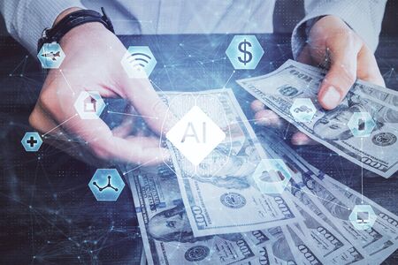 Double exposure of technology drawing hologram and us dollars bills and man hands. Data conceptの写真素材