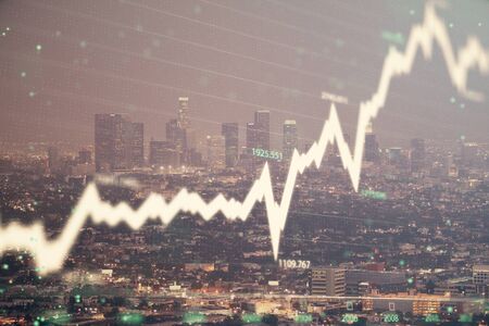 Financial graph on night city scape with tall buildings background double exposure. Analysis...