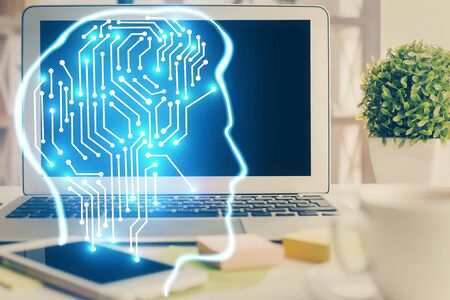 Double exposure of work space with computer and human brain drawing hologram. Brainstorm concept.の写真素材