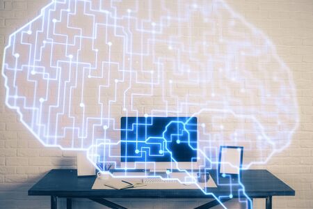 Multi exposure of work space with computer and human brain hologram. Brainstorm concept.