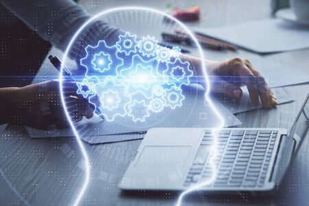 Multi exposure of woman hands working on computer and human brain hologram drawing. Ai tech concept.