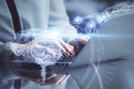 Multi exposure of woman hands working on computer and human brain hologram drawing. Ai tech concept.