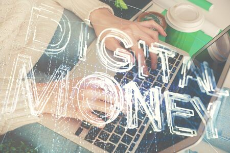 Double exposure of woman hands typing on computer and crypto market theme hologram drawing. Blockchain concept.の写真素材