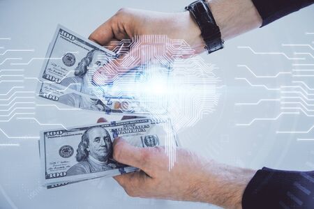 Multi exposure of brain drawing hologram and us dollars bills and man hands. Ai invest concept