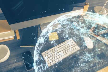 Computer on desktop with social network theme icon. Multi exposure. Concept of international...