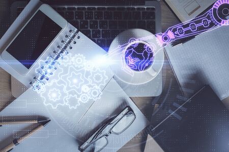 Double exposure of technology theme drawing over work table desktop. Top view. Global data analysis concept.の写真素材