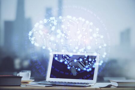 Double exposure of work table with computer and brain sketch hologram. Brainstorming concept.
