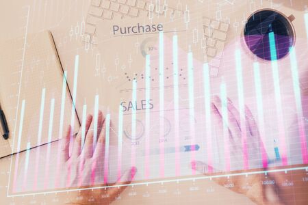 FOREX chart multi exposure with work table background. Top View. Concept of success.の写真素材
