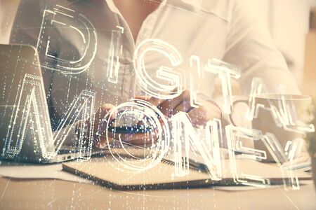 Double exposure of blockchain business sketch hologram and woman holding and using a mobile device.の写真素材