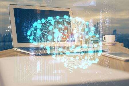 Multi exposure of work space with computer and human brain hologram. Brainstorm concept.の写真素材