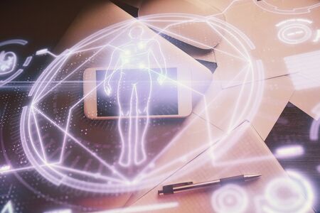 Double exposure of education theme drawing over table with phone. Top view. Science education...
