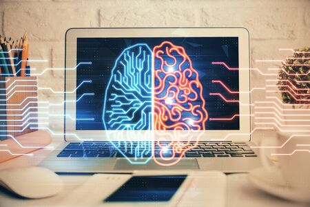 Double exposure of work space with computer and human brain drawing hologram. Brainstorm concept.の写真素材