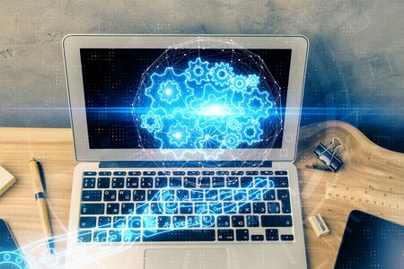 Double exposure of desktop computer and technology theme hologram. Concept of software development.の写真素材