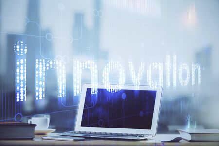 Technology theme drawing and work space with computer. Double exposure. Concept of innovation.の写真素材