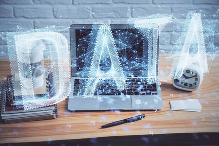 Technology theme drawing and table with computer. Double exposure. Concept of information.の写真素材