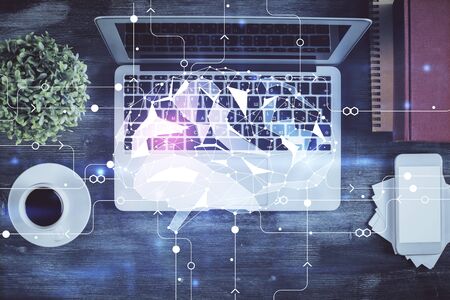 Double exposure of brain drawing hologram over topview work table background with computer. Concept...