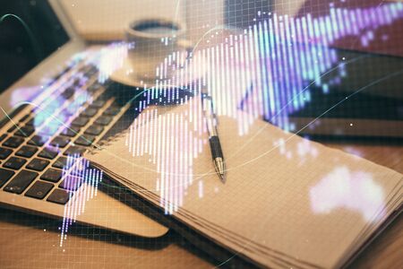 Double exposure of business theme drawing and desktop with coffee and items on table background. Concept of market tradingの写真素材