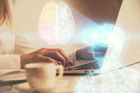 Double exposure of woman hands typing on computer and man in AR glasses drawing. Education concept.