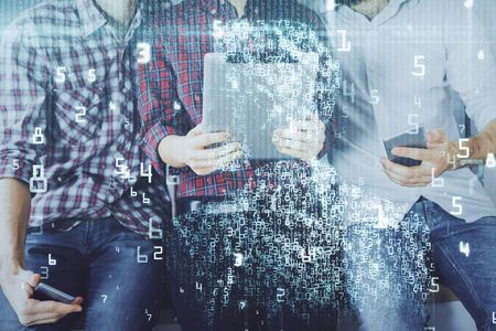 Double exposure of data theme hologram drawing and man and woman working together holding and using...