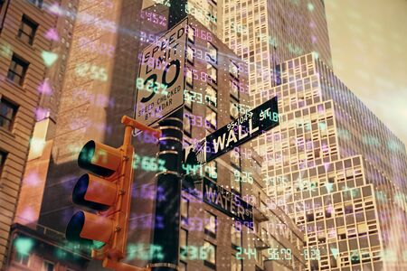 Forex chart on cityscape with tall buildings background multi exposure. Financial research concept.の写真素材