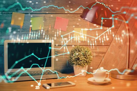 Multi exposure of forex graph and work space with computer. Concept of international online trading.の写真素材