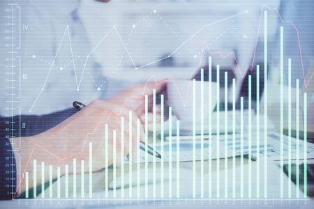 Double exposure hands with stock market chart. Concept of research and analysis.の写真素材