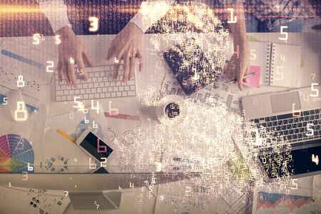 Double exposure of man and woman working together and technology theme drawing. Computer background....