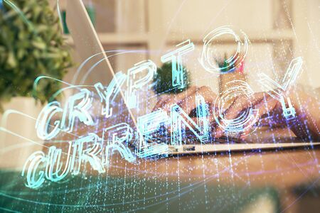 Double exposure of woman hands typing on computer and crypto market theme hologram drawing....