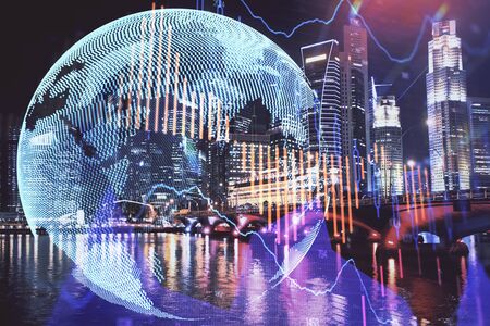 Financial chart on city scape with tall buildings background multi exposure. Analysis concept.の写真素材