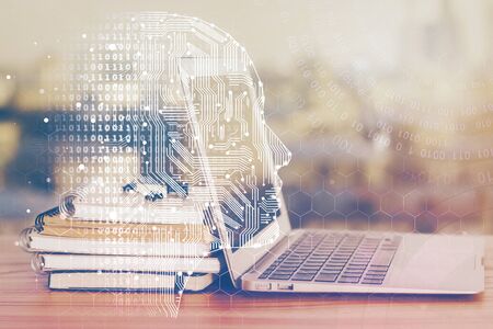 Multi exposure of work table with computer and brain hologram. Brainstorm concept.の写真素材