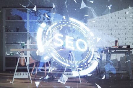 Double exposure of SEO drawing and office interior background. Concept of Search optimization engine.の写真素材