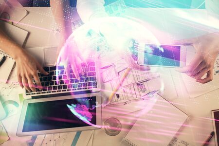 Double exposure of man and woman working together and technology theme drawing. Computer background....