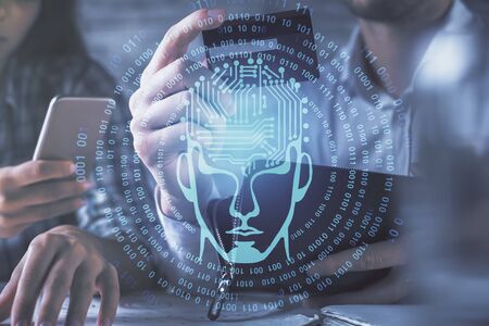 Double exposure of man and woman on-line shopping holding a credit card and brain hologram drawing....