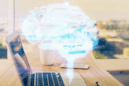 Multi exposure of work space with computer and human brain hologram. Brainstorm concept.