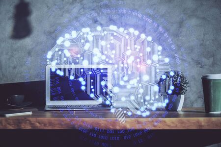 Double exposure of work table with computer and brain sketch hologram. Brainstorming concept.