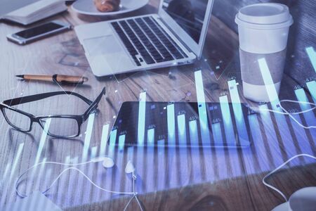Double exposure of forex chart drawing and cell phone background. Concept of financial tradingの写真素材