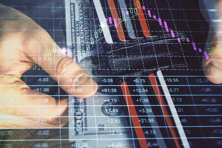 Multi exposure of forex graph drawing hologram and USA dollars bills and man hands. Technical...