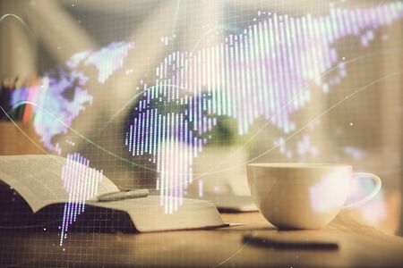 Double exposure of business theme drawing and desktop with coffee and items on table background. Concept of market tradingの写真素材