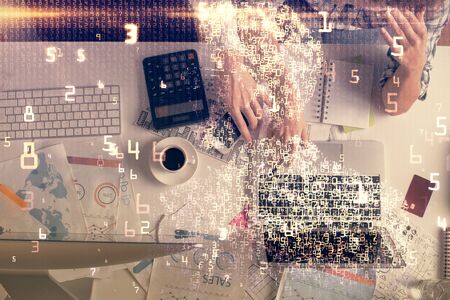 Double exposure of man and woman working together and technology theme drawing. Computer background. Top View. High tech concept.の写真素材