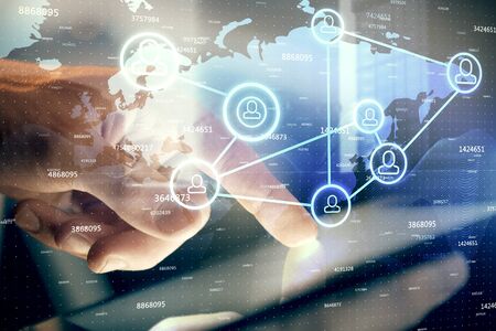 Double exposure of mans hands holding and using a phone and social network theme drawing.の写真素材