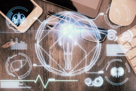 Double exposure of education theme drawing over table with phone. Top view. Science education...