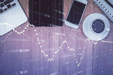 Double exposure of technology theme drawing over work table desktop. Top view. Global data analysis concept.の写真素材
