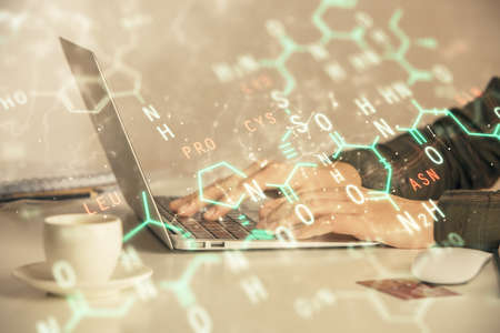 Double exposure of woman hands typing on computer and formula hologram drawing. Education concept.
