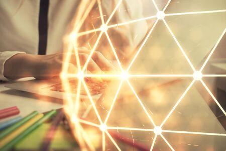 Double exposure of woman hands typing on computer and social network theme hologram drawing. People media concept.の写真素材