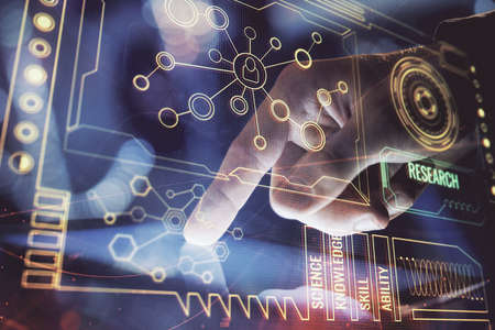 Multi exposure of mans hand holding and using a digital device and data theme drawing. Innovation...