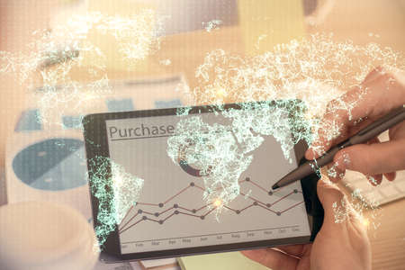 Double exposure of mans hands holding and using a phone and social network theme drawing.の写真素材