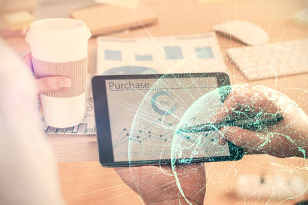 Double exposure of mans hands holding and using a phone and social network theme drawing.の写真素材