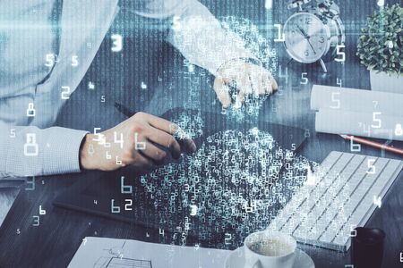 Multi exposure of mans hands holding and using a digital device and data theme drawing. Innovation...