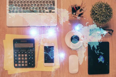 Double exposure of social network theme drawing over table with phone. Top view. People connecting concept.の写真素材